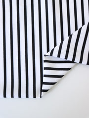 Load image into Gallery viewer, 1/4" Ivory & 1/8" Black Vertical Stripe Nylon Spandex Tricot | Designer Deadstock