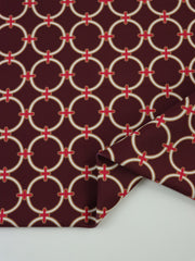 Load image into Gallery viewer, White Rings on Maroon Nylon Spandex Tricot | Designer Deadstock