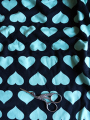 Load image into Gallery viewer, 1YD Mint Hearts on Black Double Brushed Poly Jersey | Kayla's Destash