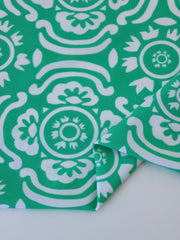 Load image into Gallery viewer, White Floral on Green Nylon Spandex Tricot | Designer Deadstock