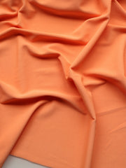 Load image into Gallery viewer, Cantaloupe Ribbed Polyester Spandex Tricot