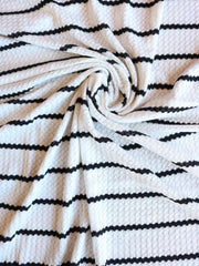 Load image into Gallery viewer, 4YD 20IN REMNANT; 1.5" Ivory & .5" Black Stripe Waffle Sweater Knit