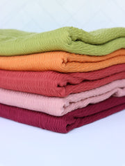 Load image into Gallery viewer, Mauve Smocked Jersey Knit