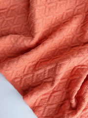 Load image into Gallery viewer, Tangerine Interwoven Squares Quilted Knit | By The Half Yard
