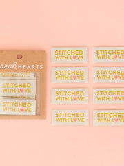 Load image into Gallery viewer, Gold &quot;Stitched With Love&quot; Woven Labels | Pack of 8 | Sarah Hearts

