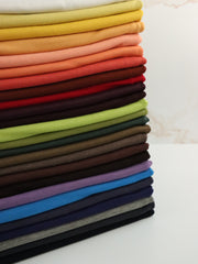 Load image into Gallery viewer, Mandarin Galway Wool Spandex Jersey Knit | By The Half Yard