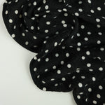 Load image into Gallery viewer, Polka Dots on Black  Brushed Hacci Sweater Knit
