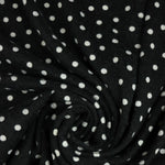 Load image into Gallery viewer, Polka Dots on Black  Brushed Hacci Sweater Knit
