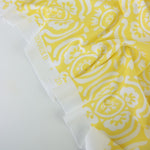 Load image into Gallery viewer, White Floral on Light Yellow Matte Nylon Spandex Tricot | Designer Deadstock
