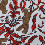 Load image into Gallery viewer, Leaping Leopards on White Nylon Spandex Tricot | Designer Deadstock
