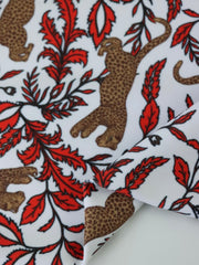 Load image into Gallery viewer, Leaping Leopards on White Nylon Spandex Tricot | Designer Deadstock
