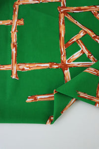 1YD PRECUT; Orange Bamboo Lattice on Kelly Green Nylon Spandex Tricot | Designer Deadstock