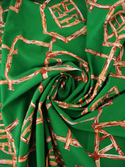 Load image into Gallery viewer, 1YD PRECUT; Orange Bamboo Lattice on Kelly Green Nylon Spandex Tricot | Designer Deadstock
