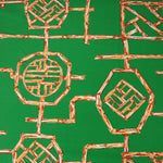 Load image into Gallery viewer, 1YD PRECUT; Orange Bamboo Lattice on Kelly Green Nylon Spandex Tricot | Designer Deadstock
