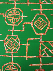 Load image into Gallery viewer, Orange Bamboo Lattice on Kelly Green Nylon Spandex Tricot | Designer Deadstock
