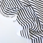 Load image into Gallery viewer, 1/4&quot; Ivory &amp; 1/8&quot; Black Vertical Stripe Nylon Spandex Tricot | Designer Deadstock
