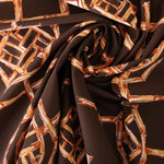 Load image into Gallery viewer, Rust Bamboo Lattice on Chocolate Nylon Spandex Tricot | Designer Deadstock
