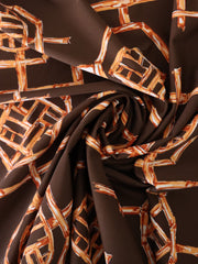 Load image into Gallery viewer, Rust Bamboo Lattice on Chocolate Nylon Spandex Tricot | Designer Deadstock
