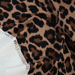 Load image into Gallery viewer, Cheetah on Bisque Matte Nylon Spandex Tricot | Designer Deadstock
