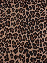 Load image into Gallery viewer, Cheetah on Bisque Matte Nylon Spandex Tricot | Designer Deadstock