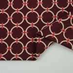 Load image into Gallery viewer, White Rings on Maroon Nylon Spandex Tricot | Designer Deadstock
