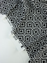 Load image into Gallery viewer, Intertwined on Black Nylon Spandex Tricot | Designer Deadstock
