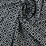Load image into Gallery viewer, Intertwined on Black Nylon Spandex Tricot | Designer Deadstock

