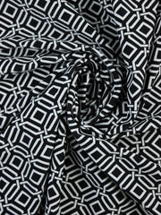 Load image into Gallery viewer, Intertwined on Black Nylon Spandex Tricot | Designer Deadstock
