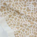 Load image into Gallery viewer, White Geometric on Beige Nylon Spandex Tricot | Designer Deadstock
