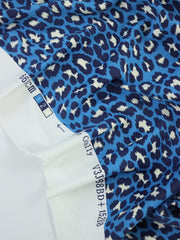 Load image into Gallery viewer, Cheetah on Blue Matte Nylon Spandex Tricot | Designer Deadstock