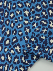 Load image into Gallery viewer, Cheetah on Blue Matte Nylon Spandex Tricot | Designer Deadstock