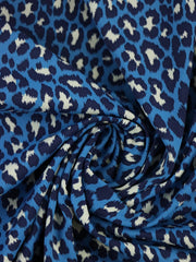 Load image into Gallery viewer, Cheetah on Blue Matte Nylon Spandex Tricot | Designer Deadstock