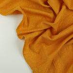 Load image into Gallery viewer, Mustard Glitter Jersey Knit | 2YD PRECUT | Designer Deadstock
