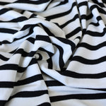 Load image into Gallery viewer, 1/4" Black &amp; 1/2" Ivory Stripe Rayon Spandex Jersey | Made in USA
