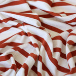Load image into Gallery viewer, 1/4" Rust &amp; 1/2" Ivory Stripe Rayon Spandex Jersey | Made in USA
