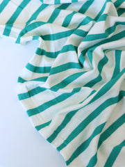 Load image into Gallery viewer, 1/4" Turquoise &amp; 1/2" Ivory Stripe Rayon Spandex Jersey | Made in USA
