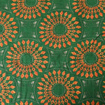 Load image into Gallery viewer, Orange Geometric Circles on Emerald Cotton Lawn
