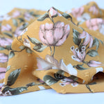 Load image into Gallery viewer, Emilia on Mustard Swiss Dot Poly Woven
