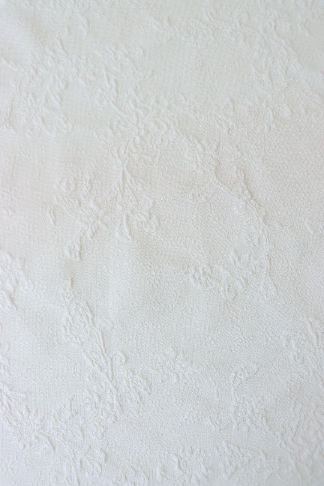 1YD 21IN REMNANT; Ivory Floral Embossed Jacquard Knit | Surge Fabric Shop