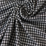 Load image into Gallery viewer, Black &amp; Ivory 1/4" Gingham Yarn Dyed Jacquard Knit
