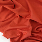 Load image into Gallery viewer, Burnt Orange Bamboo Spandex | Designer Deadstock
