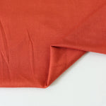 Load image into Gallery viewer, Burnt Orange Bamboo Spandex | Designer Deadstock
