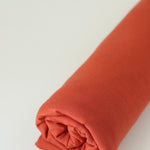 Load image into Gallery viewer, Burnt Orange Bamboo Spandex | Designer Deadstock
