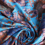 Load image into Gallery viewer, Orange &amp; Peach Floral on Blue Rayon Challis | Designer Deadstock
