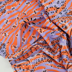 Load image into Gallery viewer, Bandana on Periwinkle &amp; Orange Tiger Swim Tricot | Italian Designer Deadstock | By The Half Yard
