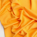 Load image into Gallery viewer, Golden Heavy Bamboo Spandex | Designer Deadstock
