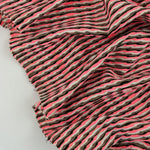 Load image into Gallery viewer, Hot Coral/Dark Taupe/Black/White/Gold Poly Spandex Jacquard | Designer Deadstock
