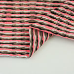 Load image into Gallery viewer, Hot Coral/Dark Taupe/Black/White/Gold Poly Spandex Jacquard | Designer Deadstock
