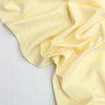 Load image into Gallery viewer, Pastel Yellow Heavy Bamboo Spandex | Designer Deadstock
