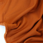 Load image into Gallery viewer, 1YD 2IN REMNANT; Burnt Orange Polartec Power Stretch Fleece
